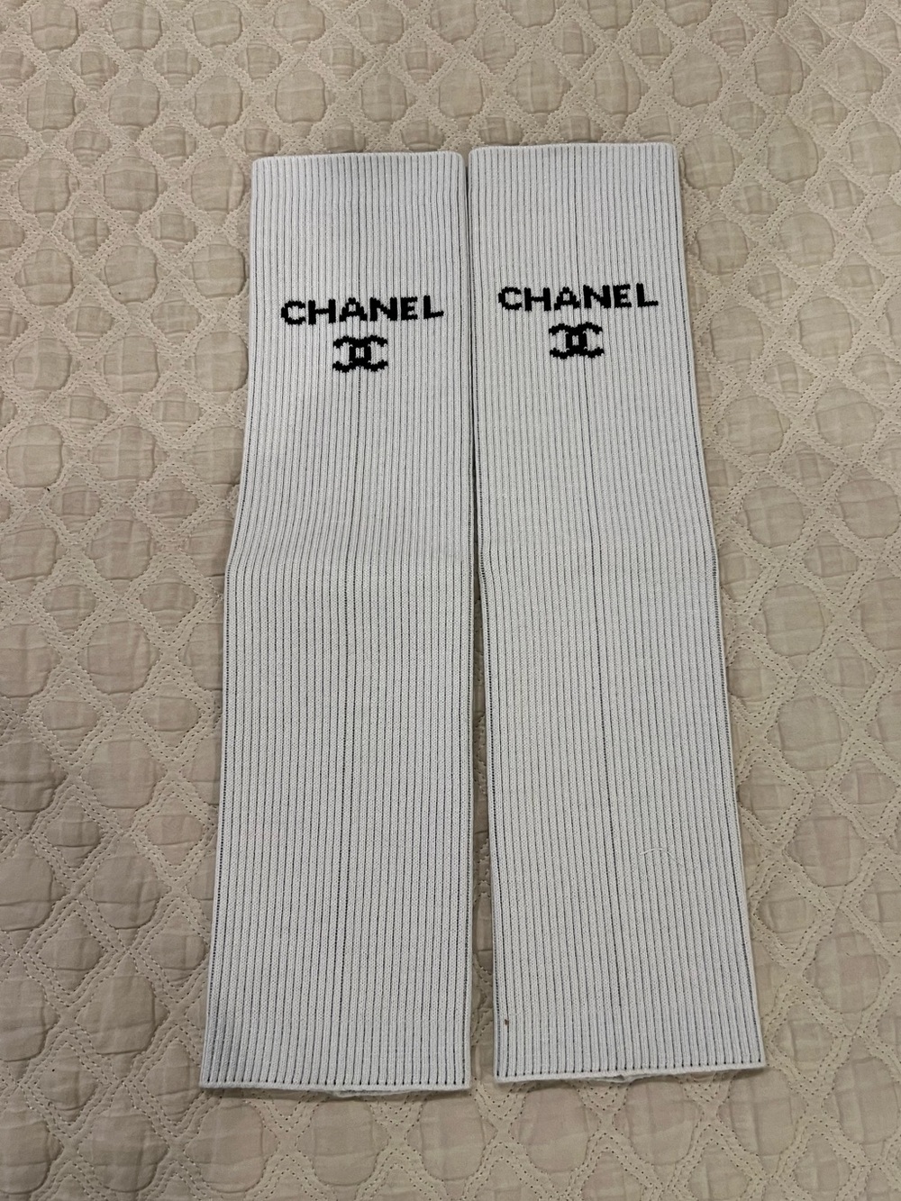 CHANEL Runway White Knit Leg Warmers with Black Logo 24C